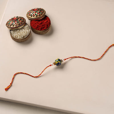 Handmade Blue Pottery & GS Bead Work Rakhi 05