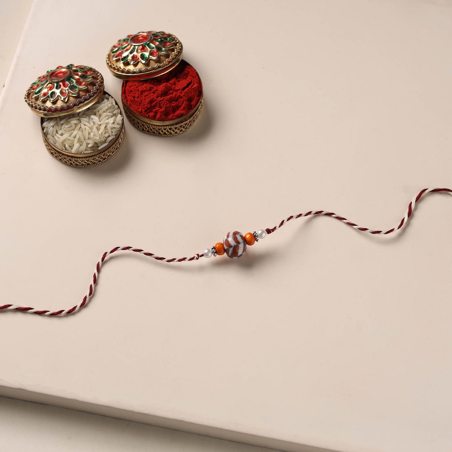 Handmade Blue Pottery & GS Bead Work Rakhi 06