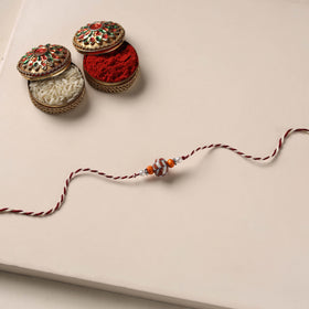 Handmade Blue Pottery & GS Bead Work Rakhi 06