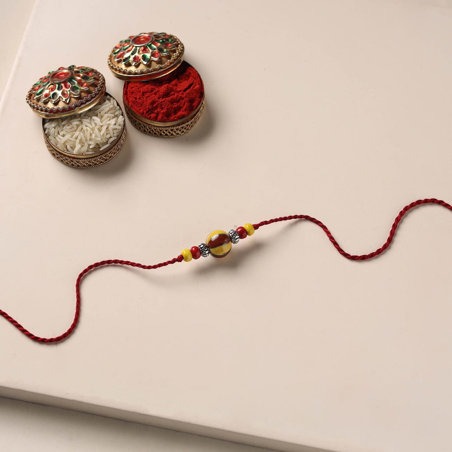Handmade Blue Pottery & GS Bead Work Rakhi 08