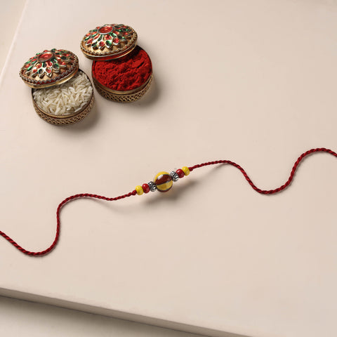 Handmade Blue Pottery & GS Bead Work Rakhi 08