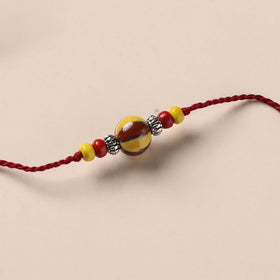 Handmade Blue Pottery & GS Bead Work Rakhi 08