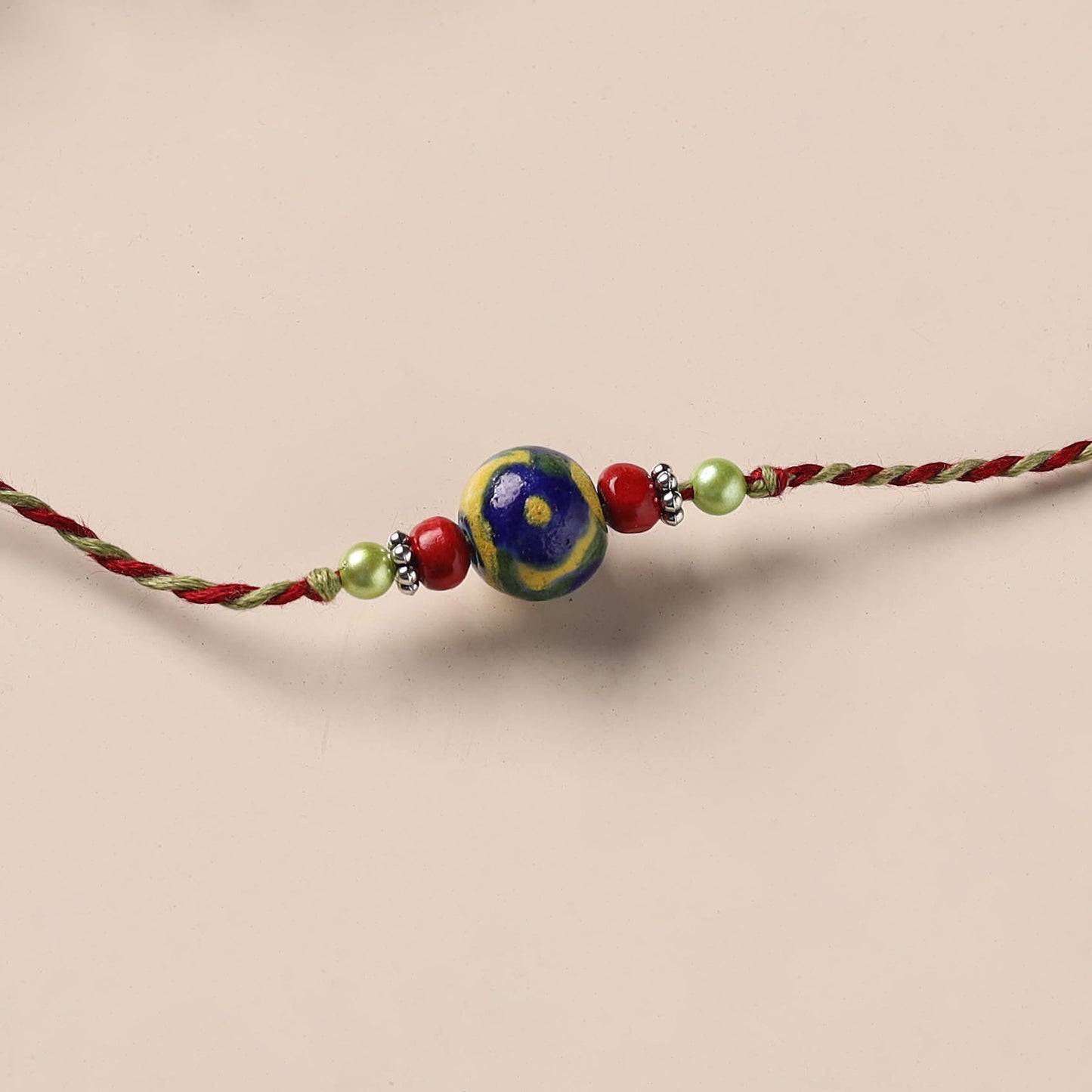 Handmade Blue Pottery & GS Bead Work Rakhi 10