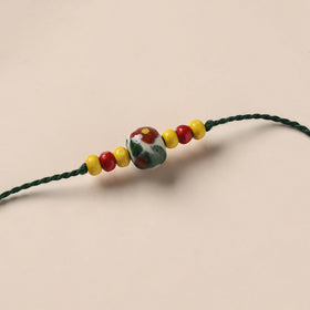 Handmade Blue Pottery & GS Bead Work Rakhi 11