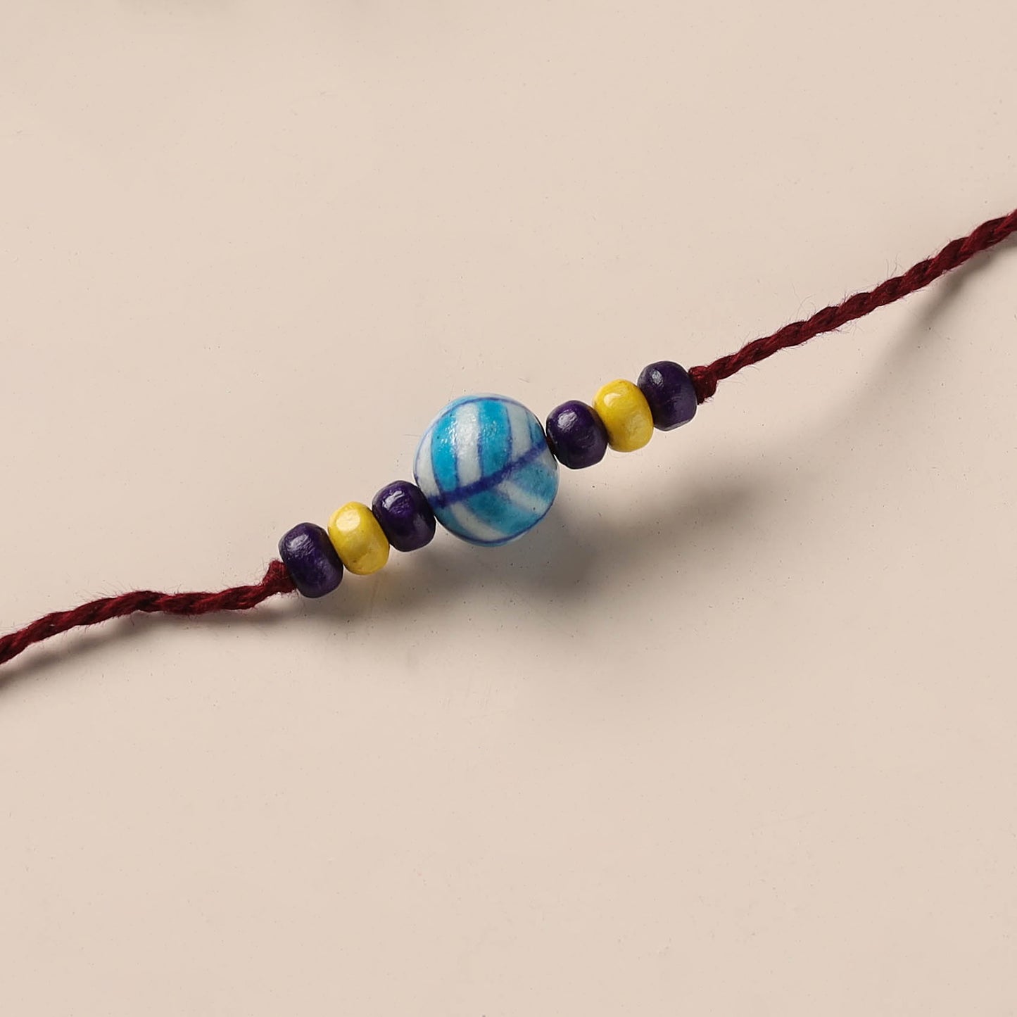Handmade Blue Pottery & GS Bead Work Rakhi 12