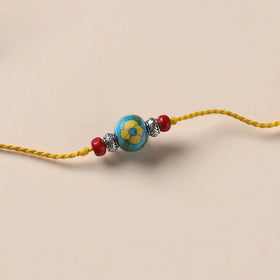 Handmade Blue Pottery & GS Bead Work Rakhi 13
