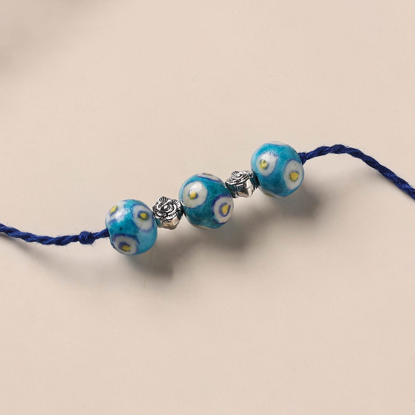 Handmade Blue Pottery & GS Bead Work Rakhi 16