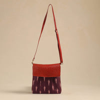 Handcrafted Ikat Fabric Sling Bag with Embossed Leather Flap