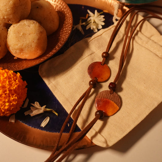 Handcrafted "Ambar" Textured Copper Enamel Rakhi by Ekibeki