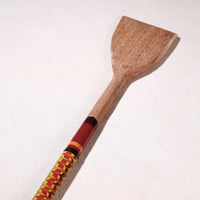 lacquered wooden spatula