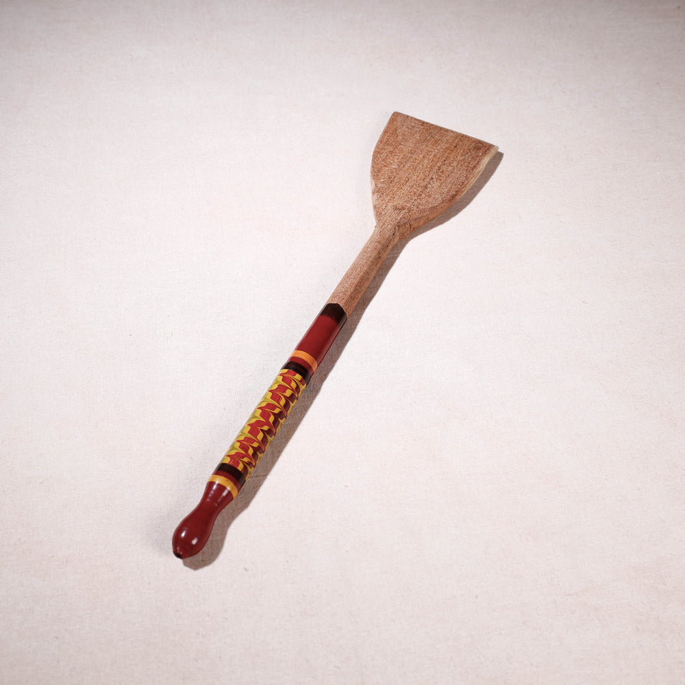 lacquered wooden spatula