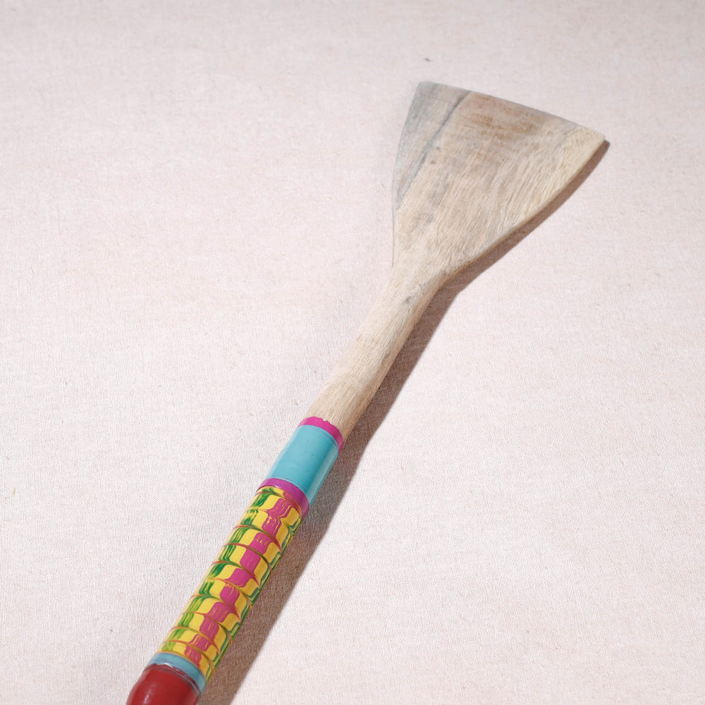 lacquered wooden spatula