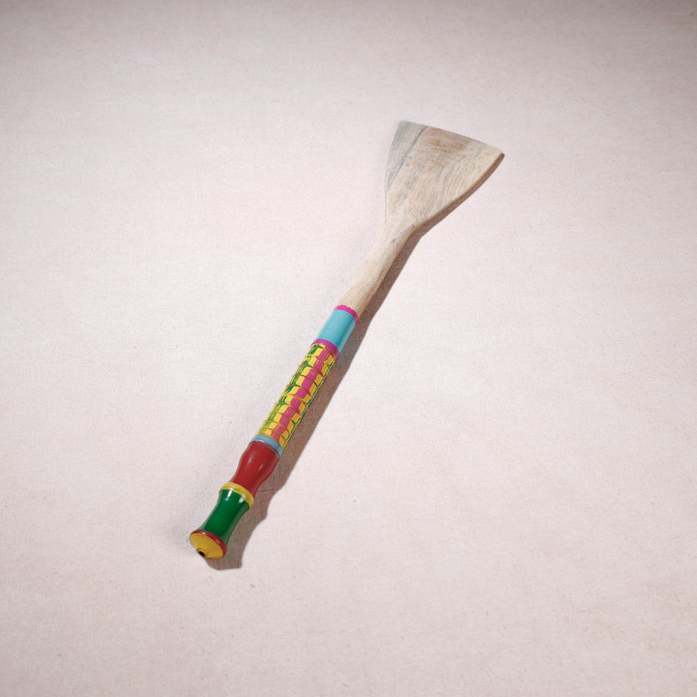 lacquered wooden spatula