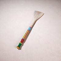 lacquered wooden spatula