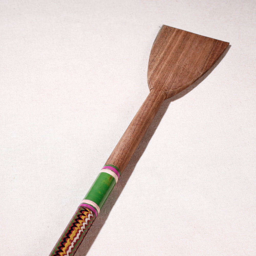 lacquered wooden spatula