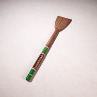 lacquered wooden spatula