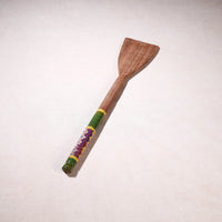 lacquered wooden spatula