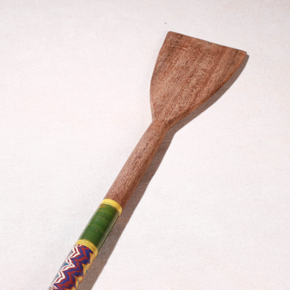 lacquered wooden spatula