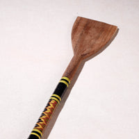 lacquered wooden spatula