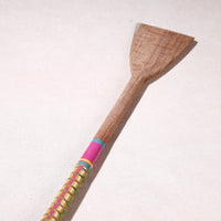 lacquered wooden spatula