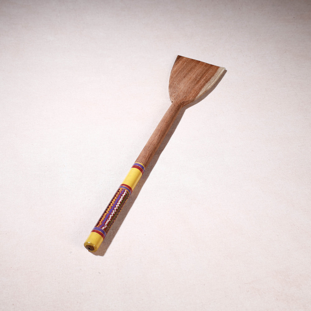 lacquered wooden spatula