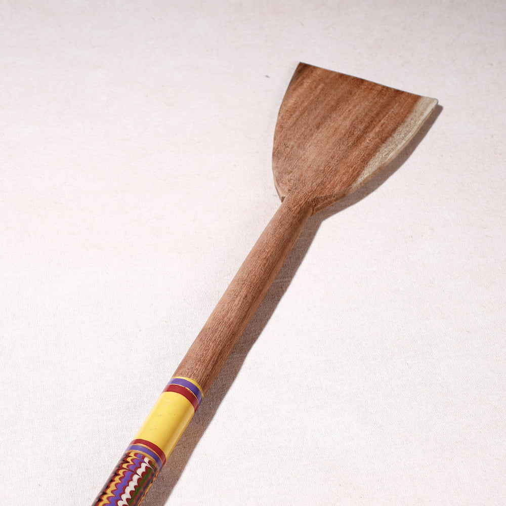 lacquered wooden spatula