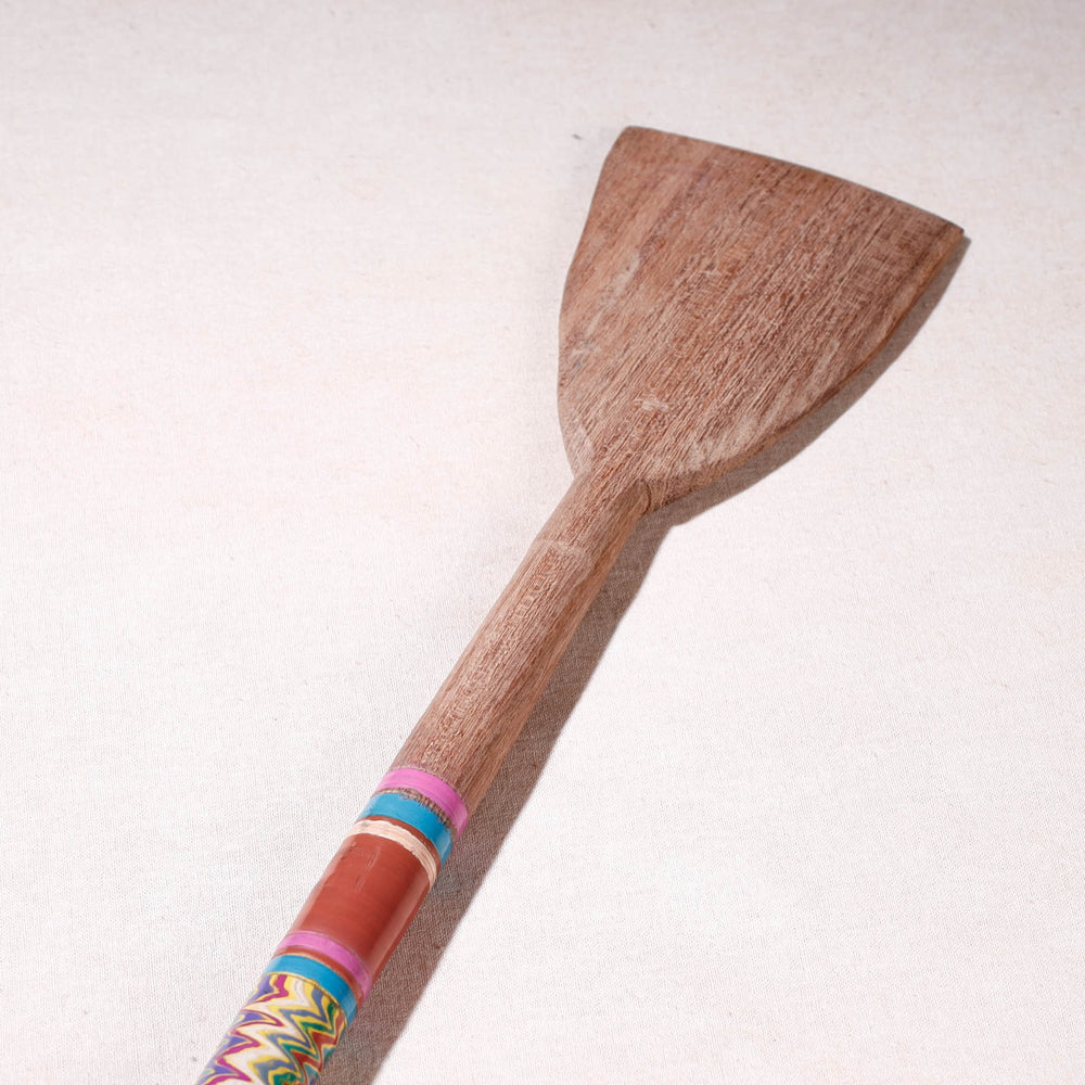 lacquered wooden spatula