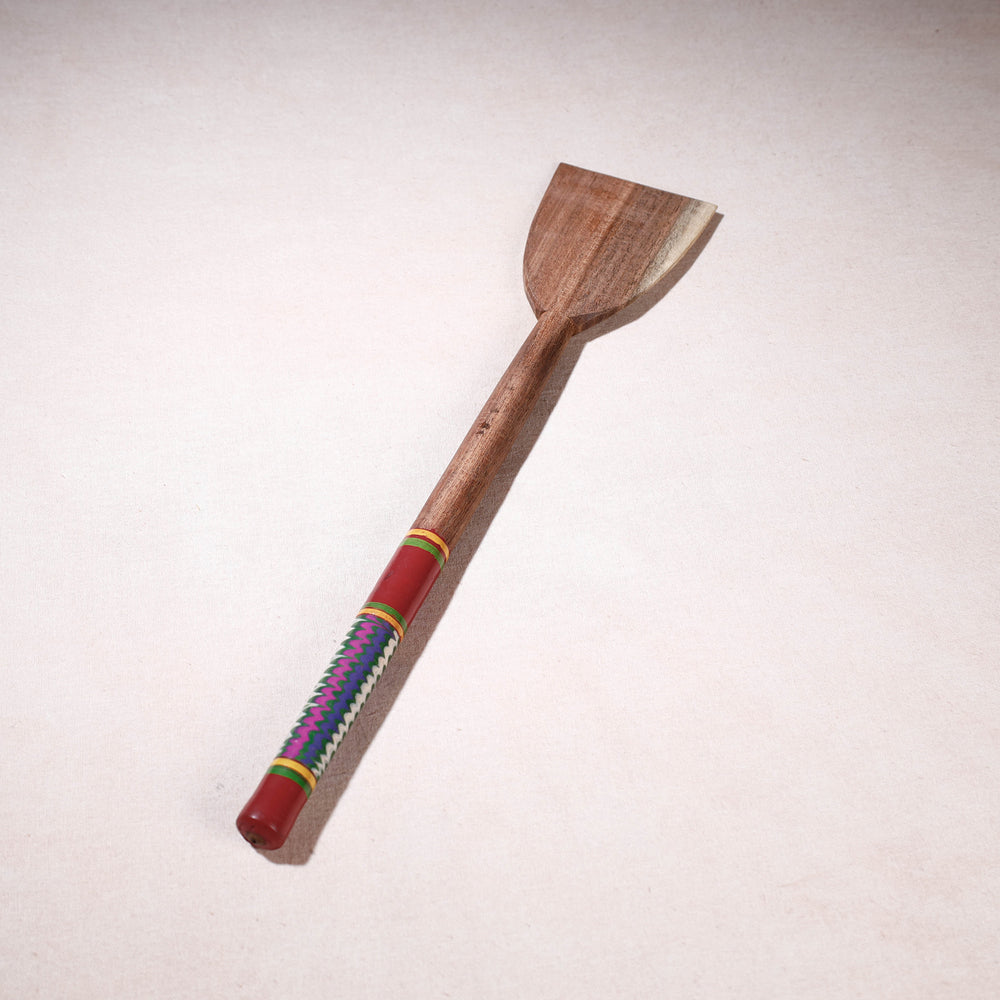 lacquered wooden spatula