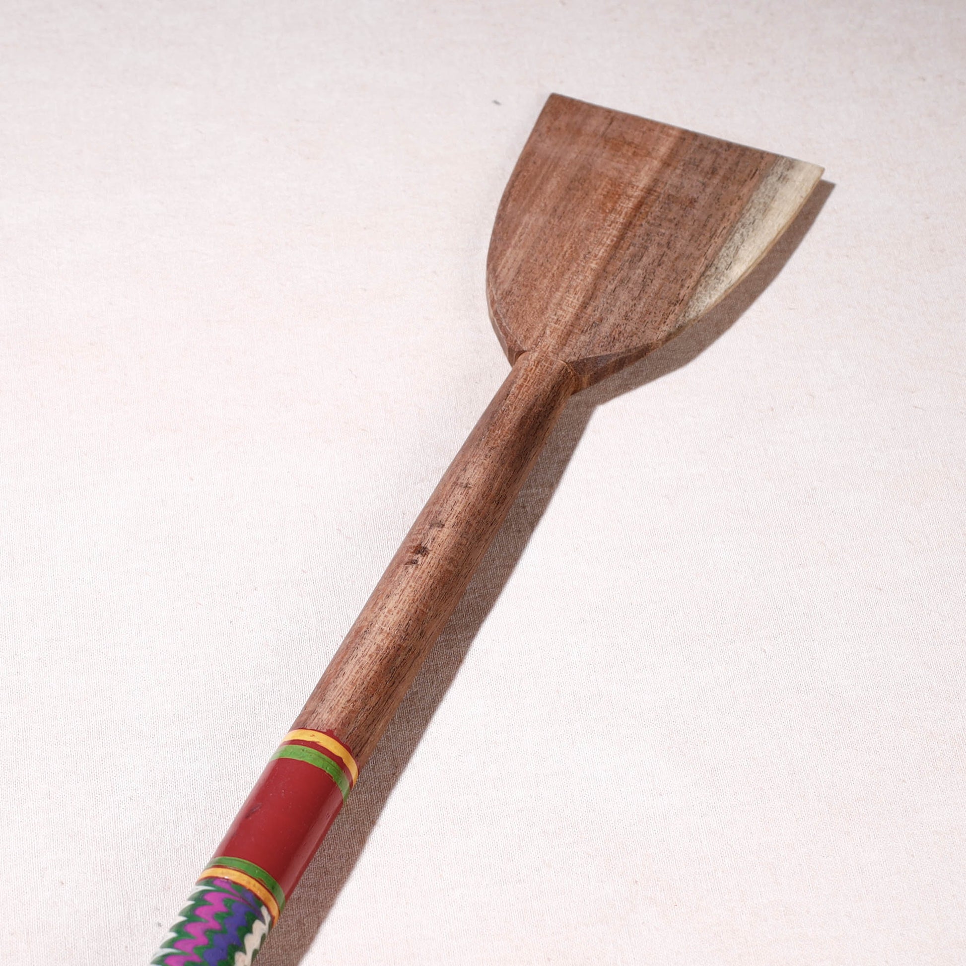 lacquered wooden spatula