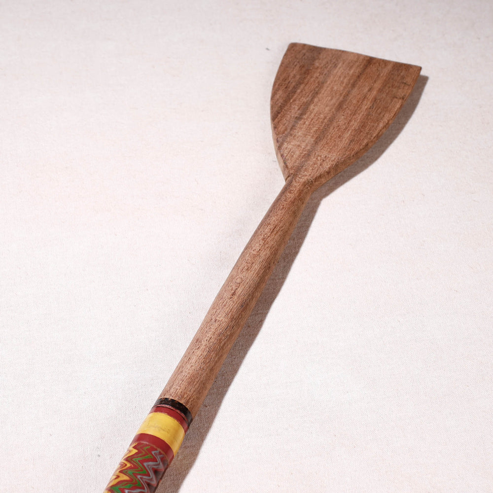 lacquered wooden spatula