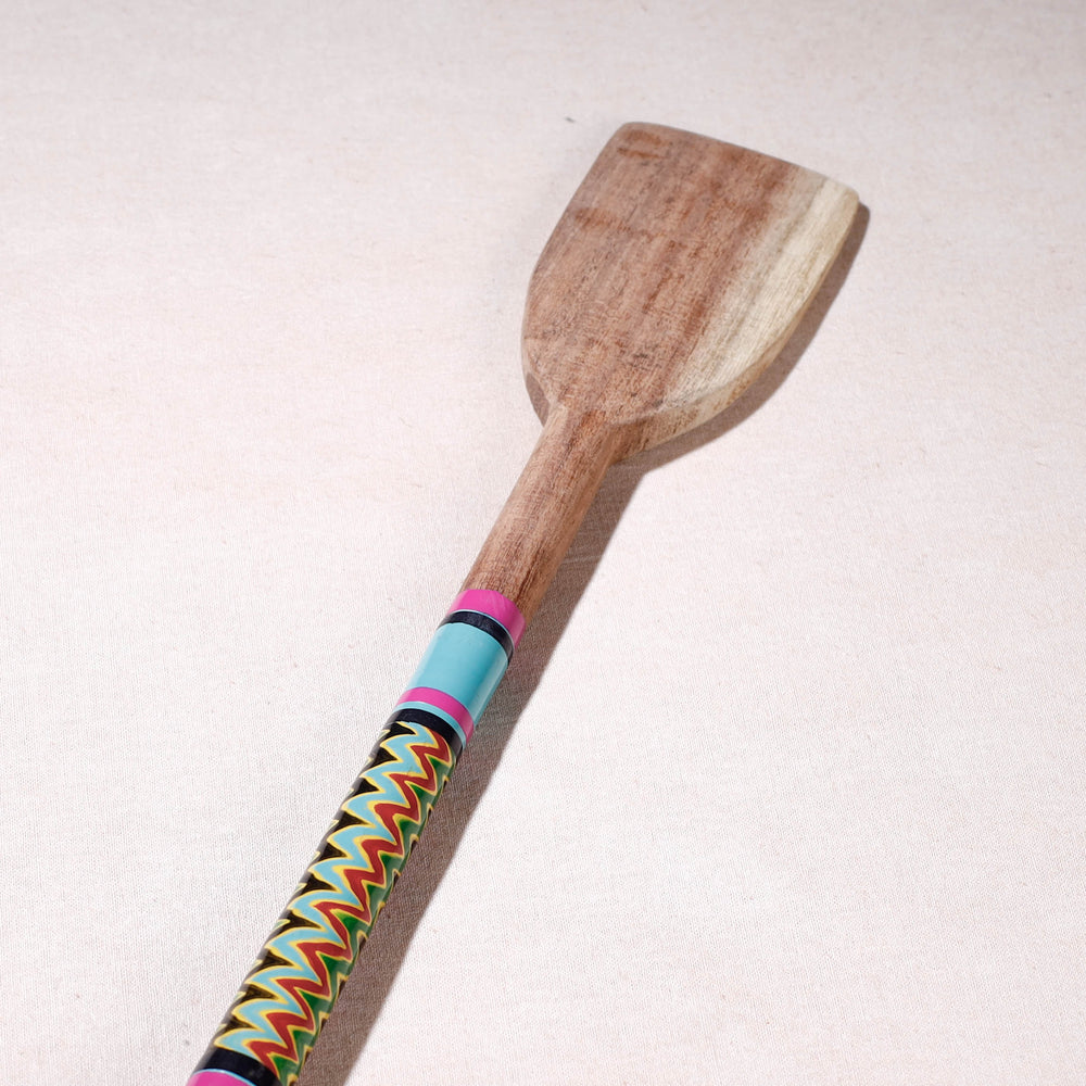 lacquered wooden spatula