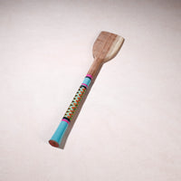 lacquered wooden spatula