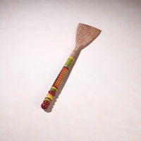 lacquered wooden spatula