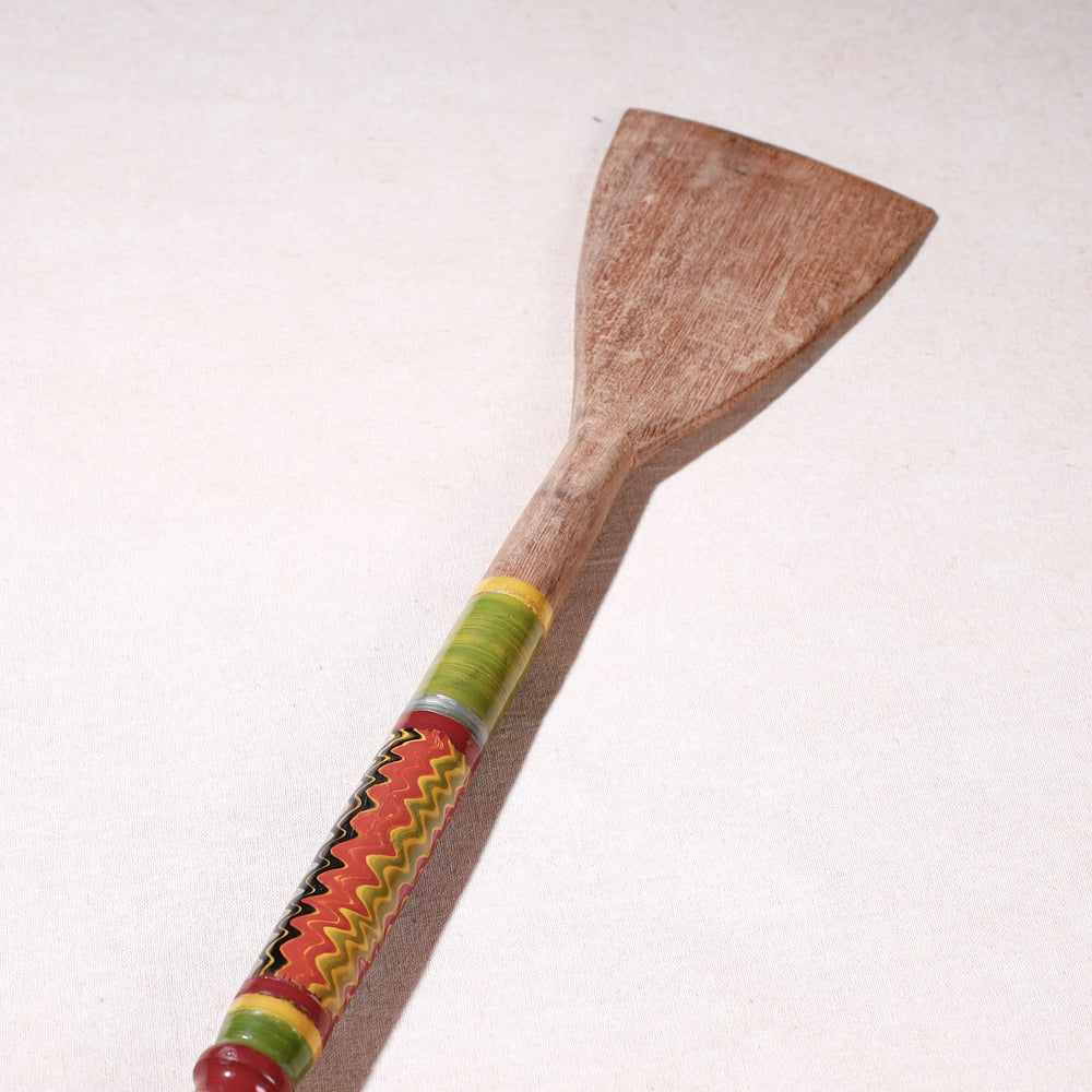 lacquered wooden spatula