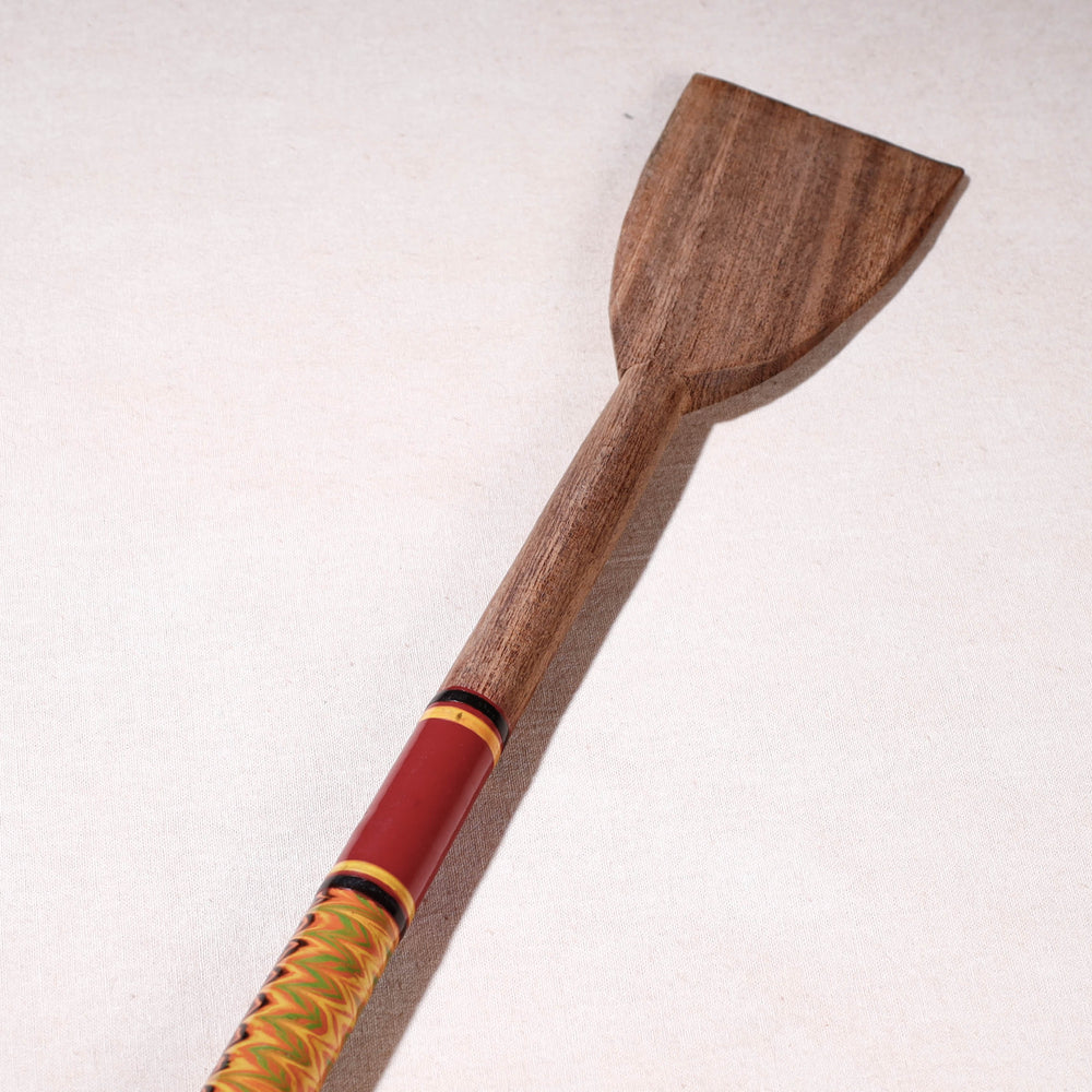 lacquered wooden spatula