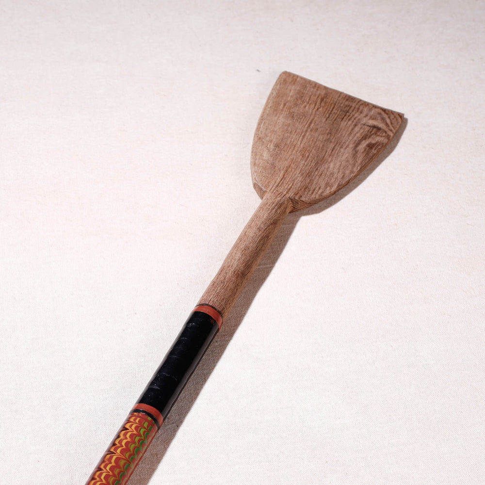 lacquered wooden spatula