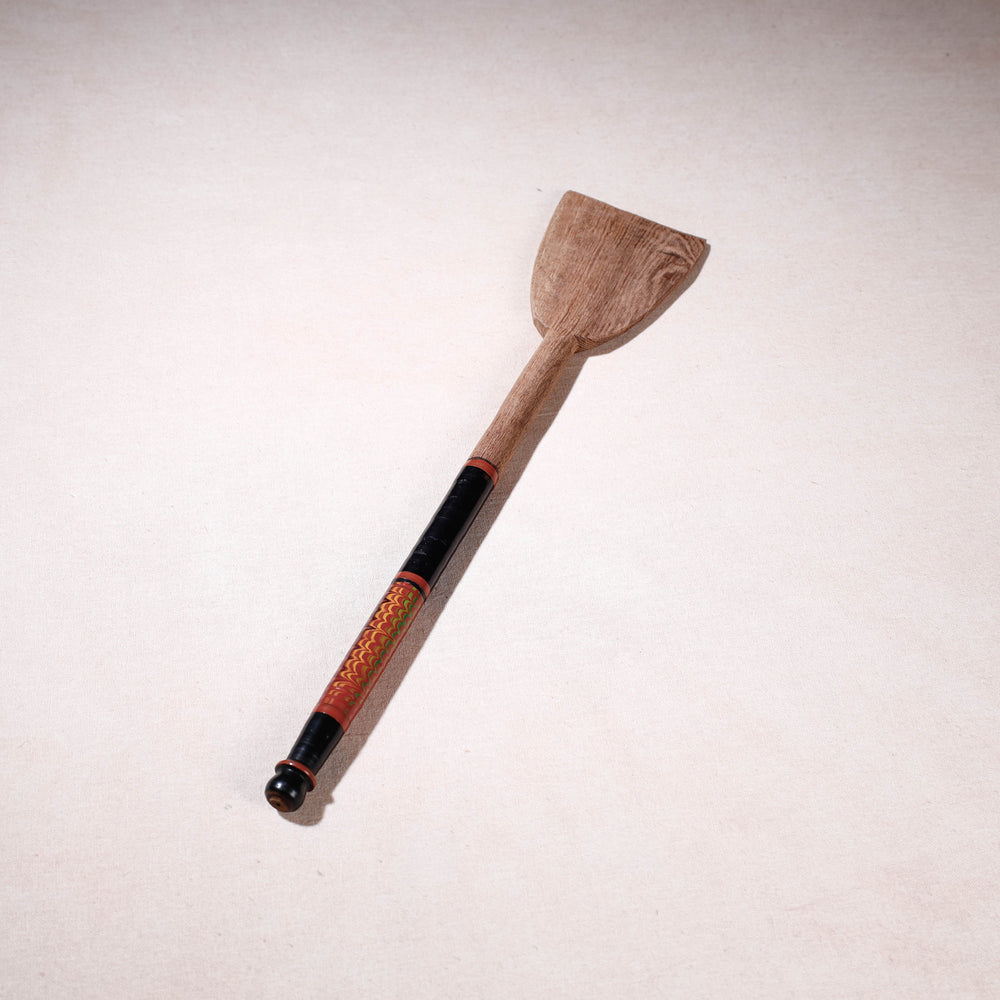 lacquered wooden spatula