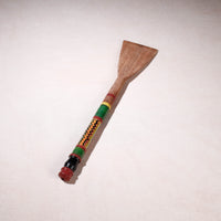 lacquered wooden spatula