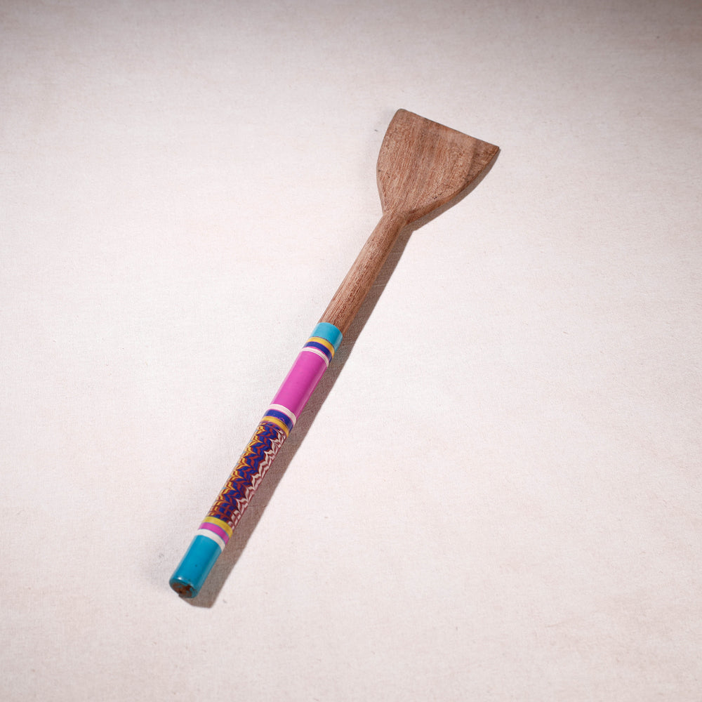 lacquered wooden spatula