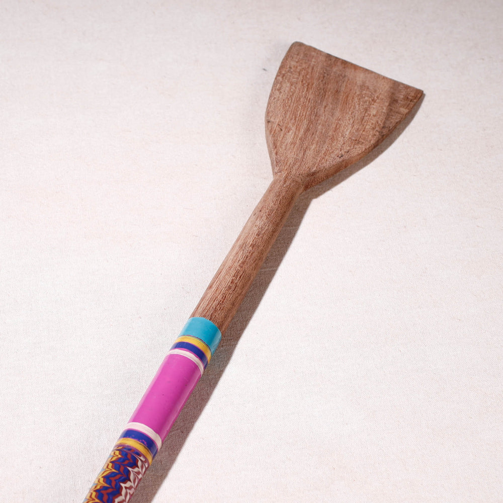 lacquered wooden spatula