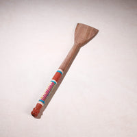 lacquered wooden spatula