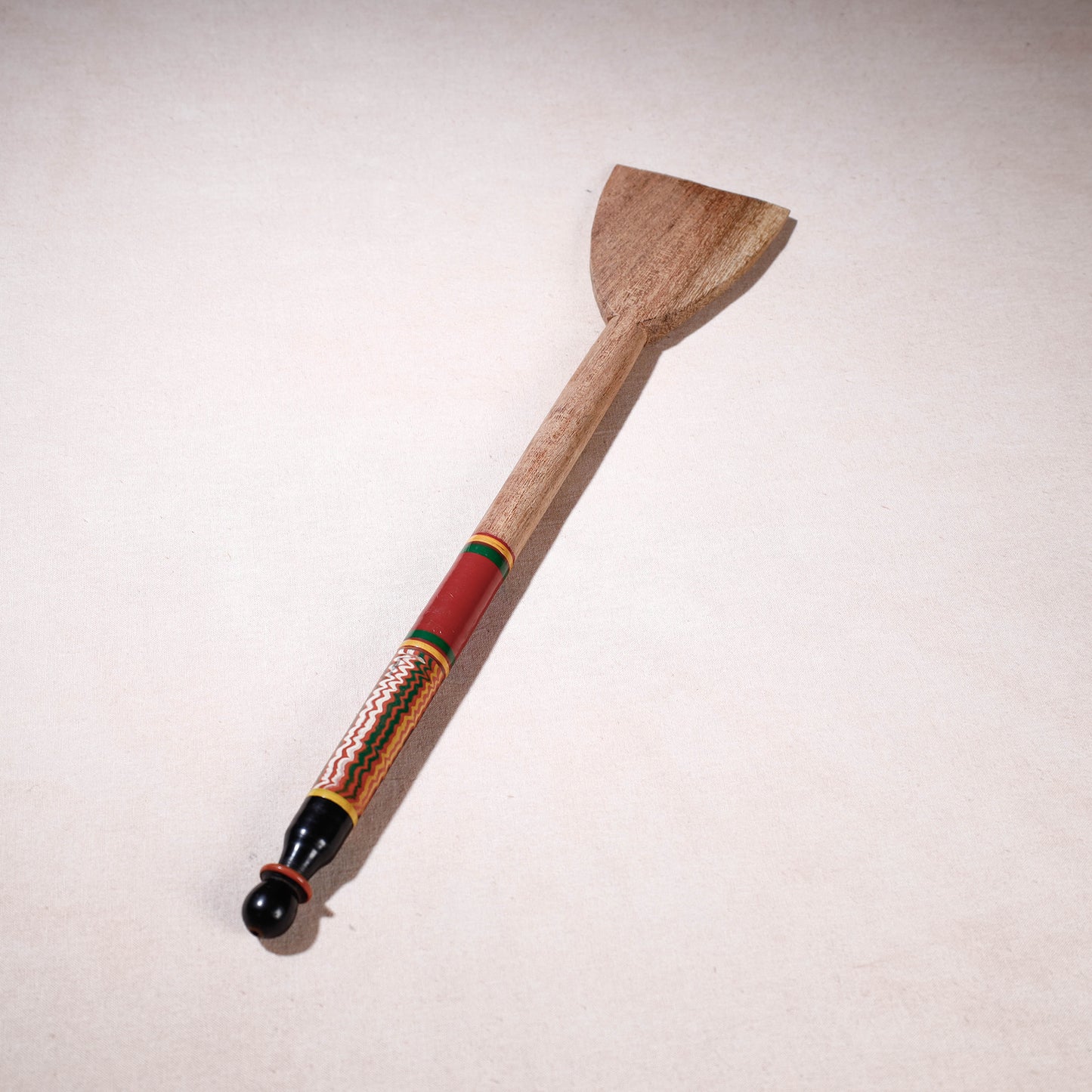 lacquered wooden spatula