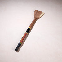 lacquered wooden spatula