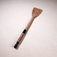 lacquered wooden spatula