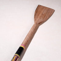 lacquered wooden spatula