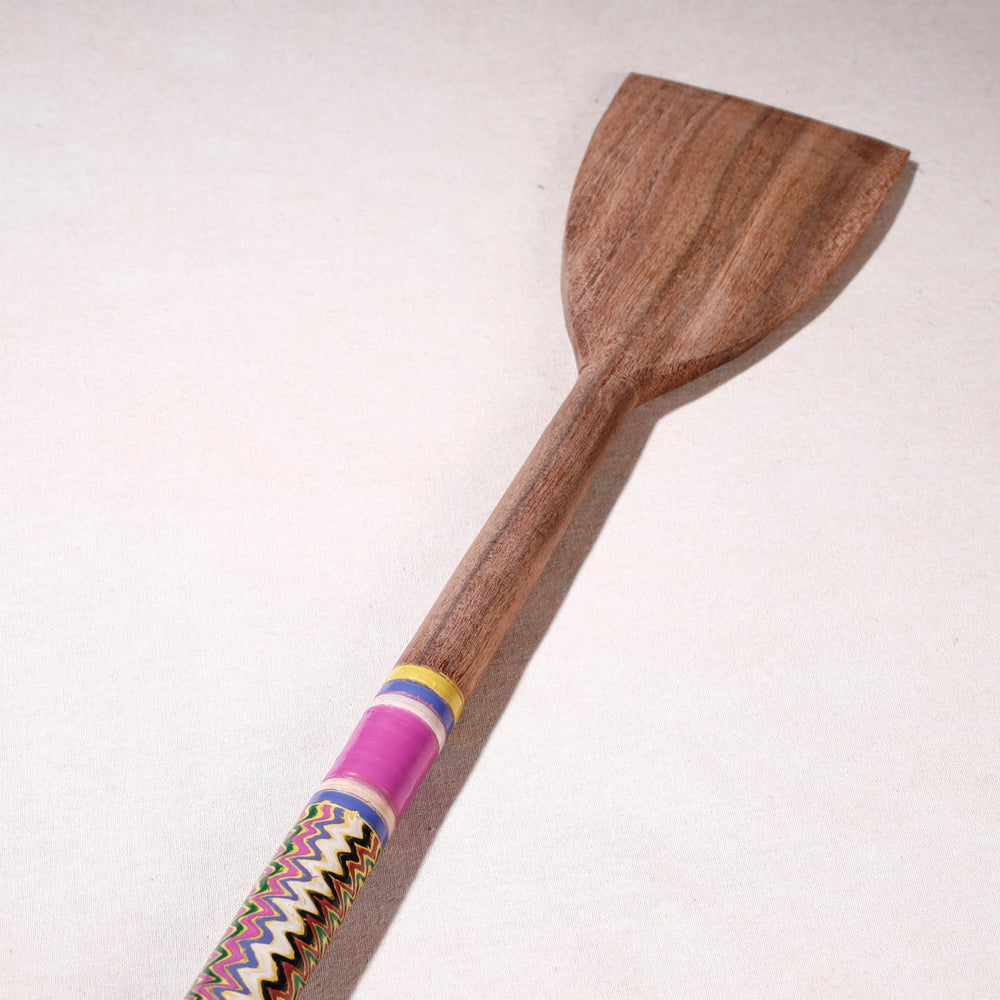 lacquered wooden spatula