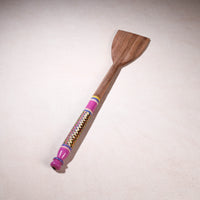 lacquered wooden spatula