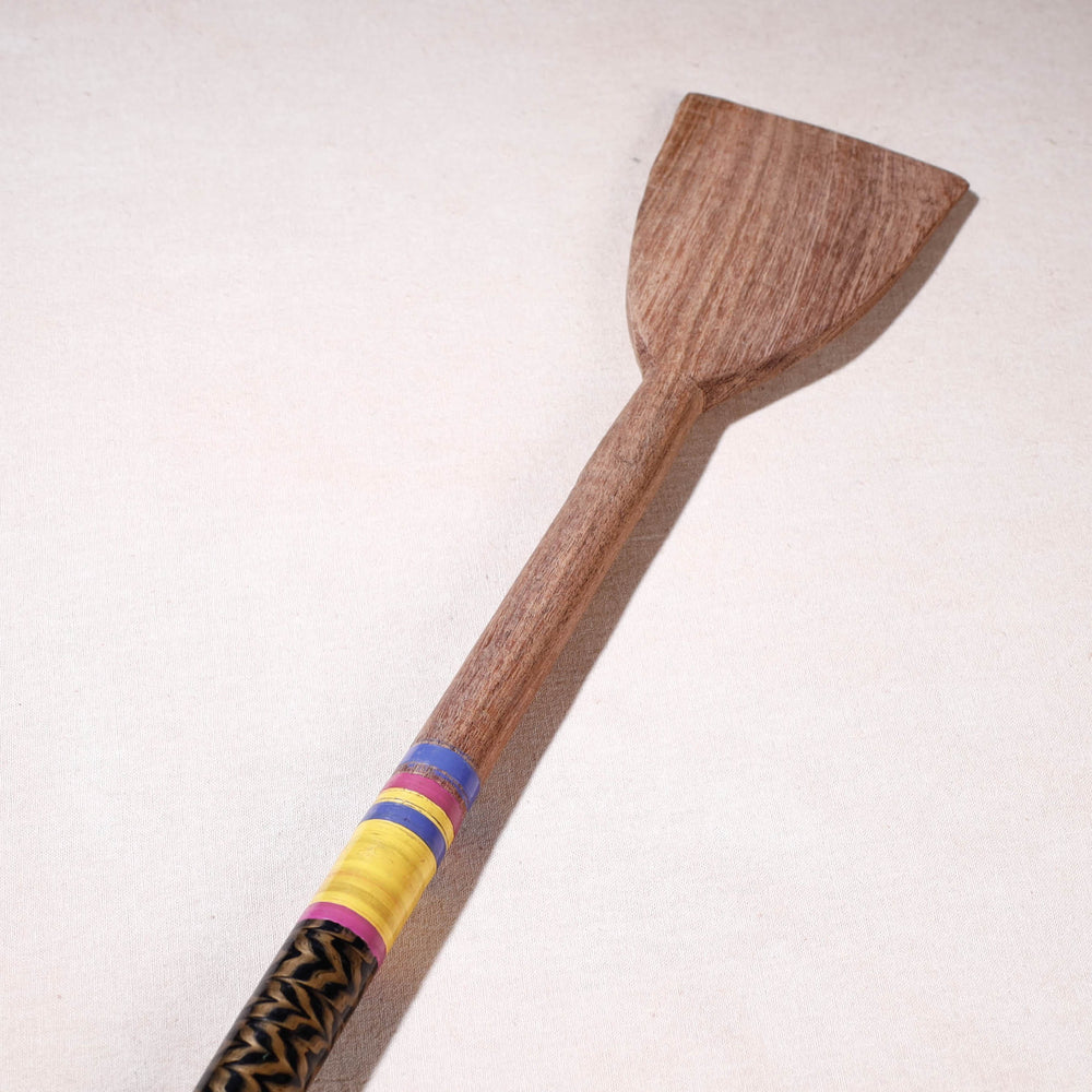 lacquered wooden spatula