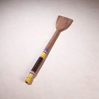 lacquered wooden spatula