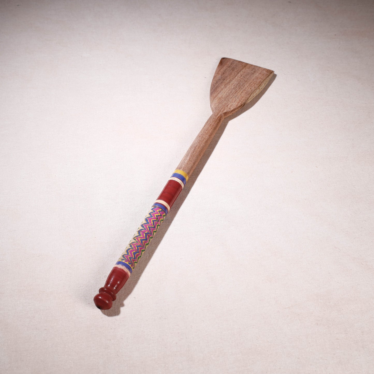 lacquered wooden spatula